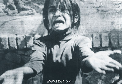 Afghan girl after her family members were killed by Jehadis rocket