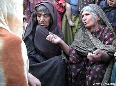 Aged mothers from Kundoz province talking to a RAWA activist