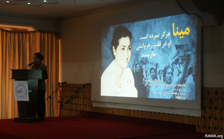 RAWA member reading memoir on the 27th martyrdom anniversary of Meena