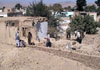 A bomb was dropped in Shahr-e-Now, though the bomb did not explode but 3 houses were destroyed due to which a woman was seriously injured. (October 18, 2001)