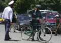 Kabul traffic cops fight to keep city moving but government slow to pay