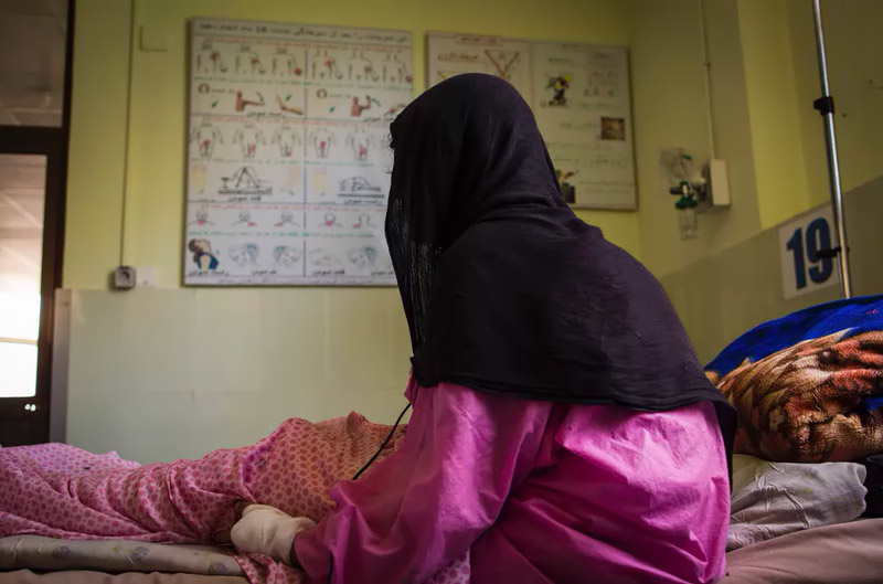 A patient at the Herat burn center in 2017. A mother of five, she says her husband set her on fire using kerosene while she was sleeping.
