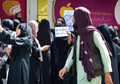 The Taliban use stun guns, fire hoses and gunfire to break up Afghan women protesting beauty salon ban