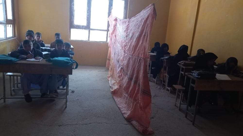 Gender segregated class room in a primary school under the Taliban.
