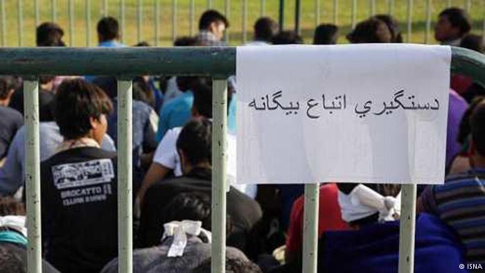 Afghan refugees in Iran placed inside cages and put on public display by Iranian police