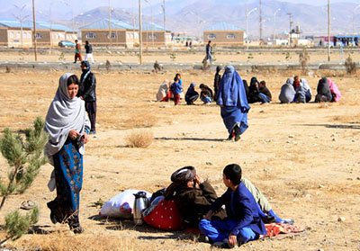 Afghan families fleeing from the districts of Malistan and Jaghori, because of the conflict between Taliban and Afghan forces, arrive in Ghazni, Afghanistan