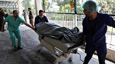 The first blast targeted a bus carrying government employees in eastern Kabul.