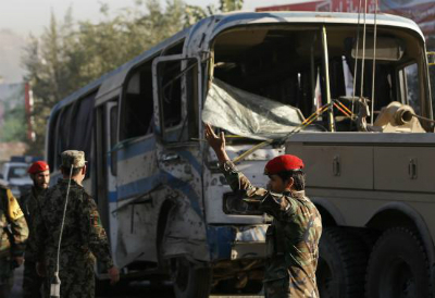 Afghan National Army soldiers (ANA) arrive at the site of a suicide bomb attack in Kabul