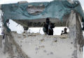 Battle at Afghanistan airport kills 37 civilians, including children