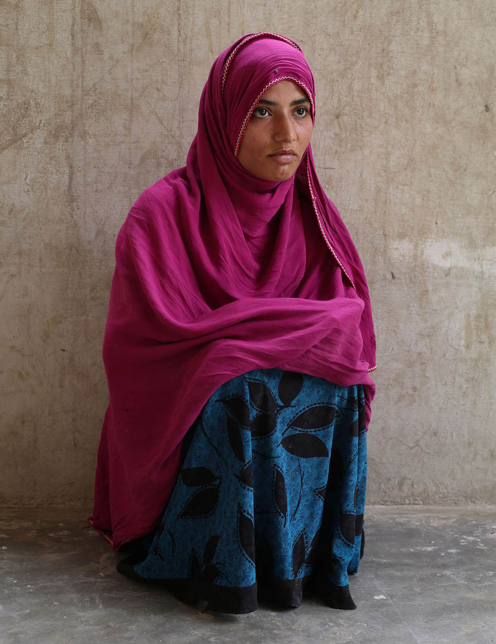 Khan Mohammad’s niece, Bibi Ameena. She and her brother work the fields and have suffered from kidney problems 