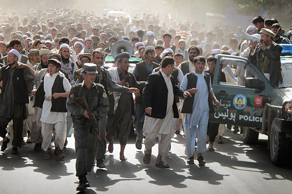 Afghan protesters throng the streets following the killing of four people in a NATO raid