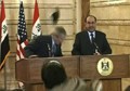 Iraqi journalist throws shoes at Bush during press conference in Baghdad