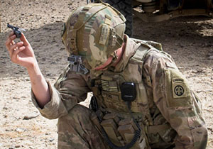 A US paratrooper prepares to launch a Black Hornet personal drone in Kandahar, Afghanistan