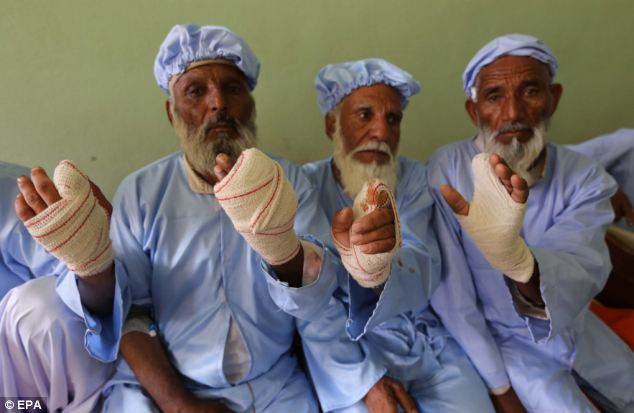 In Herat, these men had their index finger's amputated for ignoring the terror threat by Taliban to not vote