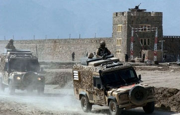 NATO soldiers patrol outside the high-security Pul-e-Charkhi Prison in Kabul