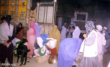 Women and children fleeing the Taliban attack on Shamali in 1999