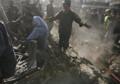Graveyard picnic bomb kills 14 women and children in Afghan east
