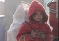 Child scavenges for family’s survival in Afghanistan