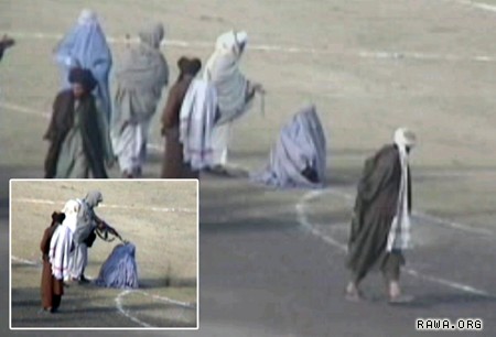 Taliban publicly execute a woman in Kabul, 1999