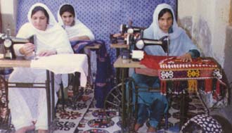 Afghan women in RAWA's workplace.