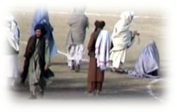 Seconds before execution a Taliban high ranked official ask Zarmeena to be silent and turn her face.