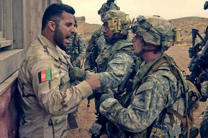 A Soldier Hits a Man